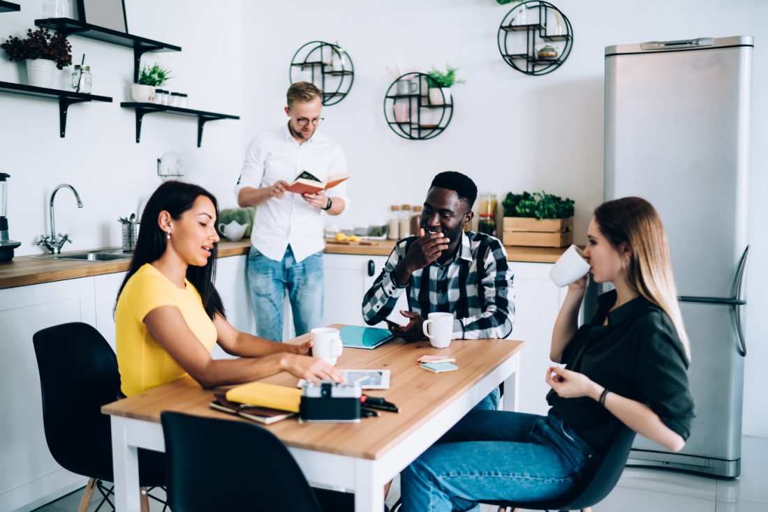 Cheerful Diverse Colleagues Working On Project