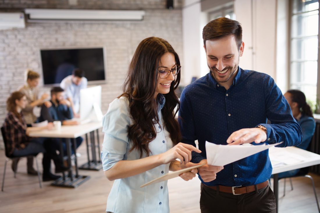 Corporate Teamworking Colleagues In Modern Office